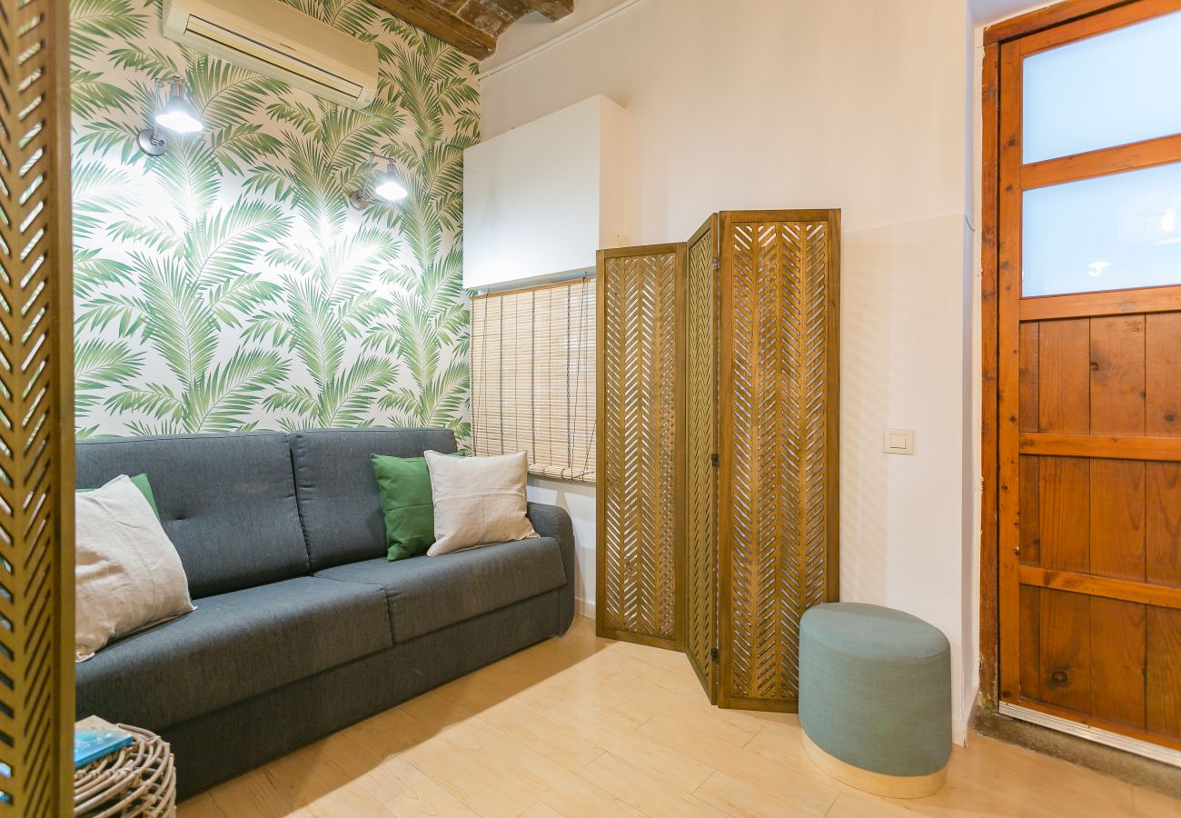 salle de repos coin détente dans un appartement 1 chambre à la Barceloneta